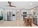 Spacious kitchen featuring stainless steel appliances and an island at 4907 Floramar Ter, New Port Richey, FL 34652