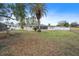 View of the house from the backyard, showing the screened porch at 5155 Norfolk Ct, New Port Richey, FL 34653