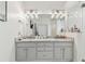 Modern bathroom with a double vanity and updated fixtures at 609 Salt Lake Dr, Tarpon Springs, FL 34689