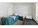 Small bedroom with two twin beds and window at 609 Salt Lake Dr, Tarpon Springs, FL 34689