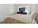 Simple bedroom with a double bed and built-in closet at 609 Salt Lake Dr, Tarpon Springs, FL 34689