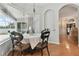 Charming breakfast nook with views of the pool and backyard at 609 Salt Lake Dr, Tarpon Springs, FL 34689