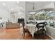 Bright dining area with a view of the backyard and pool at 609 Salt Lake Dr, Tarpon Springs, FL 34689