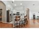 Spacious kitchen with granite countertops and stainless steel appliances at 609 Salt Lake Dr, Tarpon Springs, FL 34689