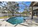 Relaxing screened pool and patio area, great for outdoor enjoyment at 609 Salt Lake Dr, Tarpon Springs, FL 34689