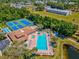 Aerial view of community pool and tennis courts at 6428 Gloria Dr # 26, New Port Richey, FL 34653