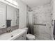 Updated bathroom with a walk-in shower and modern vanity at 6428 Gloria Dr # 26, New Port Richey, FL 34653