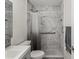 Updated bathroom with a walk-in shower and modern vanity at 6428 Gloria Dr # 26, New Port Richey, FL 34653