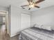 Bedroom with ceiling fan and double door closet at 6428 Gloria Dr # 26, New Port Richey, FL 34653