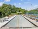 Bocce ball court with benches by the lake at 6428 Gloria Dr # 26, New Port Richey, FL 34653