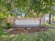 Sunnybrook community entrance sign with landscaping at 6428 Gloria Dr # 26, New Port Richey, FL 34653