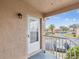 Condo entryway with private balcony overlooking the parking lot at 6428 Gloria Dr # 26, New Port Richey, FL 34653