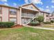Brick building exterior with stairs and landscaping at 6428 Gloria Dr # 26, New Port Richey, FL 34653