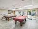 Community room with two billiard tables at 6428 Gloria Dr # 26, New Port Richey, FL 34653