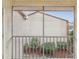 View from a screened balcony overlooking condo building and landscaping at 6428 Gloria Dr # 26, New Port Richey, FL 34653
