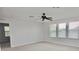 Large bedroom with neutral walls and carpet at 8424 Bluevine Sky Dr, Land O Lakes, FL 34637