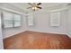 Spacious bedroom with wood flooring and window blinds at 8424 Bluevine Sky Dr, Land O Lakes, FL 34637