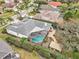 Aerial view showing house, pool, and gazebo at 8831 Bel Meadow Way, Trinity, FL 34655