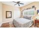 Bright bedroom featuring a comfortable bed and plenty of closet space at 8831 Bel Meadow Way, Trinity, FL 34655