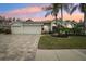 Beautiful home with three-car garage and landscaped yard at 8831 Bel Meadow Way, Trinity, FL 34655