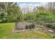 Landscaped garden with raised beds and various plants at 8831 Bel Meadow Way, Trinity, FL 34655