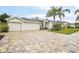 Two-car garage and paver driveway at 8831 Bel Meadow Way, Trinity, FL 34655