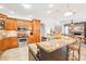 Well-equipped kitchen featuring wood cabinets and a large island at 8831 Bel Meadow Way, Trinity, FL 34655
