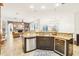 Modern kitchen with granite counters and stainless steel appliances at 8831 Bel Meadow Way, Trinity, FL 34655