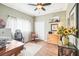 Home office with built-in desk and plenty of natural light at 8831 Bel Meadow Way, Trinity, FL 34655
