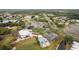 Aerial view showing community, golf course, and clubhouse at 9090 Alexandria Dr, Weeki Wachee, FL 34613