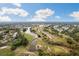 Aerial view of community golf course and landscape at 9090 Alexandria Dr, Weeki Wachee, FL 34613