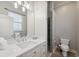Bathroom with white vanity, quartz countertop and shower at 9090 Alexandria Dr, Weeki Wachee, FL 34613