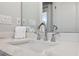 Bathroom sink with marble countertop and chrome faucet at 9090 Alexandria Dr, Weeki Wachee, FL 34613