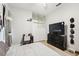 Bright bedroom with full bed, dresser, and closet at 9090 Alexandria Dr, Weeki Wachee, FL 34613