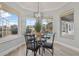 Breakfast nook with glass top table and pool view at 9090 Alexandria Dr, Weeki Wachee, FL 34613