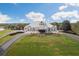 Community clubhouse with a metal roof; luxury amenities at 9090 Alexandria Dr, Weeki Wachee, FL 34613