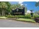 Glenlakes community entrance sign with landscaping at 9090 Alexandria Dr, Weeki Wachee, FL 34613