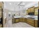 Spacious kitchen with wood cabinets, gas cooktop and breakfast nook at 9090 Alexandria Dr, Weeki Wachee, FL 34613