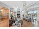 Open living room with pool view and access to the backyard at 9090 Alexandria Dr, Weeki Wachee, FL 34613