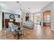 Spacious living room with fireplace and access to the pool area at 9090 Alexandria Dr, Weeki Wachee, FL 34613