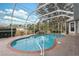Screened pool and spa with brick pavers at 9090 Alexandria Dr, Weeki Wachee, FL 34613