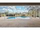 Screened pool and spa with brick pavers at 9090 Alexandria Dr, Weeki Wachee, FL 34613