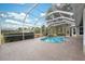 Screened pool and spa with brick pavers at 9090 Alexandria Dr, Weeki Wachee, FL 34613