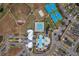 Aerial view of community pool and tennis courts at 9323 Bella Vita Cir, Land O Lakes, FL 34637