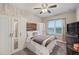 Serene bedroom with a comfy bed, built-in wardrobe, and natural light at 9323 Bella Vita Cir, Land O Lakes, FL 34637
