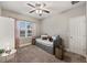 Cozy bedroom with daybed, window seating, and ample closet space at 9323 Bella Vita Cir, Land O Lakes, FL 34637