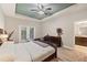 Spacious bedroom with king bed and ensuite bathroom at 9323 Bella Vita Cir, Land O Lakes, FL 34637
