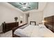 Large bedroom with king-size bed and dresser at 9323 Bella Vita Cir, Land O Lakes, FL 34637