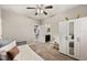Spacious bedroom with daybed, access to bathroom and additional bedroom at 9323 Bella Vita Cir, Land O Lakes, FL 34637