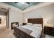 Spacious bedroom with large bed, ceiling fan, and plenty of natural light at 9323 Bella Vita Cir, Land O Lakes, FL 34637